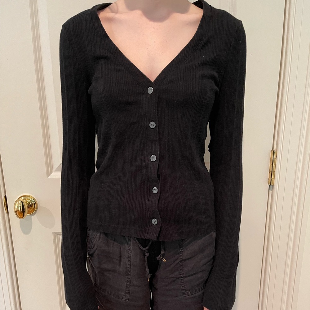 Black long sleeve button up. V Neck